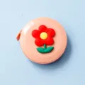 Mini mètre ruban rose portable avec une décoration de fleur rouge 3D pour la couture. - Fleur rouge