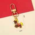 Cute Chinese zodiac horse keychain featuring Fu character saddle for New Year gift - Brown