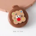 Portable cute cartoon folding air cushion hairbrush with integrated mirror in brown - Cute Red Nose