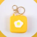 Creative yellow silicone coin purse with cute poached egg design and gold keychain clasp - Yellow Base Fried Egg