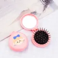 Portable pink cartoon folding hair brush with mirror featuring cute girl character design - Pink Box - Bow Girl / Cartoon Folding Hairbrush