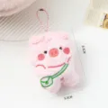 Adorable pink plush pig keychain doll pendant with dimension markings 8.3cm and 6.5cm - 8.3x6.5cm