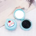 Compact light blue foldable air cushion hairbrush with mirror and cute bear design - Blue Box - Strawberry Bear / Cartoon Folding Air Cushion Combs