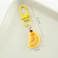 Yellow banana simulation food resin keychain with dimensions of 6.3cm and 1.6cm - 香蕉早餐盘款 / 全长6.3cm挂件宽度1.6cm