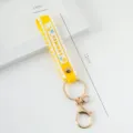 Yellow PVC wrist strap keychain with SUMMER print, 17cm length, gold-toned clasp - Solid Color / Yellow
