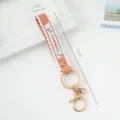 Durable PVC silicone wrist strap keychain in soft pink finish with Summer text design - Solid Color / Tan