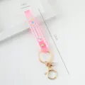 Pink PVC silicone wrist strap keychain with SUMMER print and gold hardware - Translucent Style / Deep Pink