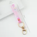 Pink wavy PVC wristlet keychain strap with SUMMER print, 17cm length for bags and gifts - Translucent Style / Light Purple