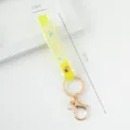 Yellow PVC silicone wrist strap keychain with SUMMER print, 17cm length variant - Translucent Style / Light Yellow