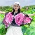 Elegant summer shawl with pink flower prints and pearl trim worn in a lotus pond - Tops / Peony Black