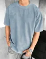 T-shirt casual da uomo in velluto a coste celeste con un elegante design a girocollo - Taglia S / Top / Azzurro