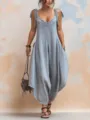 Detailed view of women's loose casual v-neck jumpsuit with pockets in light blue - S / Light Blue