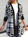 Dettaglio del cardigan lungo da donna con motivo patchwork pied de poule bianco e nero. - 1XL / Top / Nero