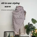 Detailed view of pink and black houndstooth cashmere-like scarf on a golden mannequin - Pink Houndstooth / 180*70