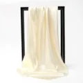 Detailed view of champagne satin square scarf showing elegant drape and silk-like luster - 90*90cm / Apricot