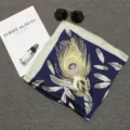 Elegant navy blue square silk scarf featuring a large golden peacock feather print detail - 70*70cm / Navy Blue