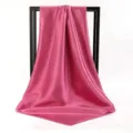 Elegant rose pink satin square scarf draped gracefully on a minimalist black stand - 90*90cm / Dusty Pink
