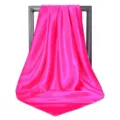 Close-up detail of a luxurious hot pink satin square scarf with elegant draping - 90*90cm / Rose Red