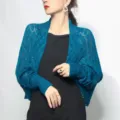 Elegant teal knitted honeycomb hollow shawl shrug for women over a simple black dress - Blue