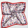 Detailed view of square silk scarf with red border and multi-color geometric print - Red Border Geometric Rectangle (Style 18)