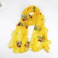 Elegant yellow embroidered mesh scarf with floral patterns and ruffled edges - 170x45cm / Yellow