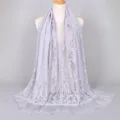Elegant light purple lace scarf featuring a floral hollow-out design and fringe tassels - 170x65cm / Gray