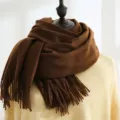 Close-up of a thick brown winter scarf with fringe tassels on a stylish mannequin - 200*70cm / Dark Coffee