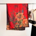 Detailed view of a retro red mulberry silk scarf with vibrant floral peony prints - 180cm / Red Peony Plum Blossom (21)