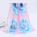 Elegant women's long chiffon scarf with large blue floral print on pink background - 155x50cm / 4 Large Flowers Pink