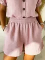 Close-up detail of a pink linen cotton casual shorts and button-up shirt set for women - S / Bottoms / Pink
