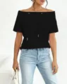 Close-up detail of a casual black off-shoulder sweatshirt with functional drawstring accents. - 3XL / Tops / Black Short Sleeve