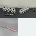 Λεπτομέρεια του μπρελόκ παιχνιδιού fidget με 4 μηχανικούς διακόπτες πληκτρολογίου - Γραμμικό 4 Πλήκτρων (Φωτεινό) / Μπλε Άξονας - Διαφανές