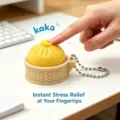 Interactive yellow 3D printed baozi fidget toy in basket for instant stress relief - Yellow