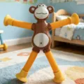 Stretchy monkey pop tube fidget toy with yellow suction cups for children sensory play - Without Lights / Orange Yellow