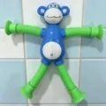 Blue and green monkey stretch tube fidget toy with suction cups for stress relief - Without Lights / Teal