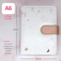 Agenda A6 de constelaciones blanca con calendario anual y mensual 2025 - 64K / Blanco
