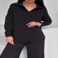 Elegante completo nero a due pezzi con camicia a maniche lunghe e pantaloni a gamba larga - Taglia S / Top E Pantaloni / Nero