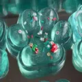 Translucent green cat paw shaped squeeze toy filled with festive Christmas charms - 13cm Large Size / Christmas Green Crystal Jumbo Cat Paw