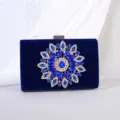 Elegant navy blue velvet evening clutch bag with a large sparkling rhinestone sunflower decoration - Blue