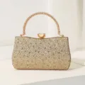 Elegante goldene Abendtasche mit funkelnden Strasssteinen und rundem Perlengriff - Gold