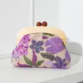 Elegant straw evening clutch with purple floral embroidery and wooden frame detail. - 24*4*19cm / Purple