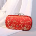 Elegante rote Vintage-Abendtasche mit Blumenstickerei und Strass-Schmetterlingsverschluss. - Rot