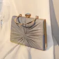 Elegante Vintage-Abendtasche mit plissiertem Design, Goldgriff und Glitzer-Finish - Blau
