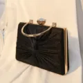 Elegante schwarze Glitzer-Abendtasche mit goldenem Griff und edlem Kristallverschluss - Schwarz