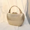 Elegante champagner-goldene Abendtasche mit funkelnden Strasssteinen und Metallgriff - Gold