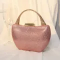Elegante rosa Strass-Abendtasche mit rundem Goldgriff für Hochzeiten und Partys. - Roségold