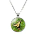 Macro detail of a 25mm yellow butterfly pendant necklace with a stainless steel chain - Swallowtail Butterfly