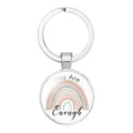 Close-up of a boho rainbow keychain with 'You Are Enough' inspirational quote on white - 25mm White K / #04