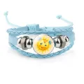 Detailed view of light blue multi-strand braided leather bracelet featuring a cute cartoon sun - 18mm / Light Blue