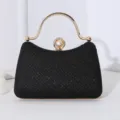 Elegante schwarze Abend-Clutch mit glitzerndem Rautenmuster und Perlenverschluss - Schwarz